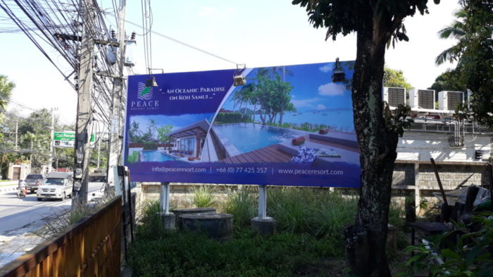 billboard with piece company logo, company information and text, an oceanic paradise on koh samui. Images from beach front villa