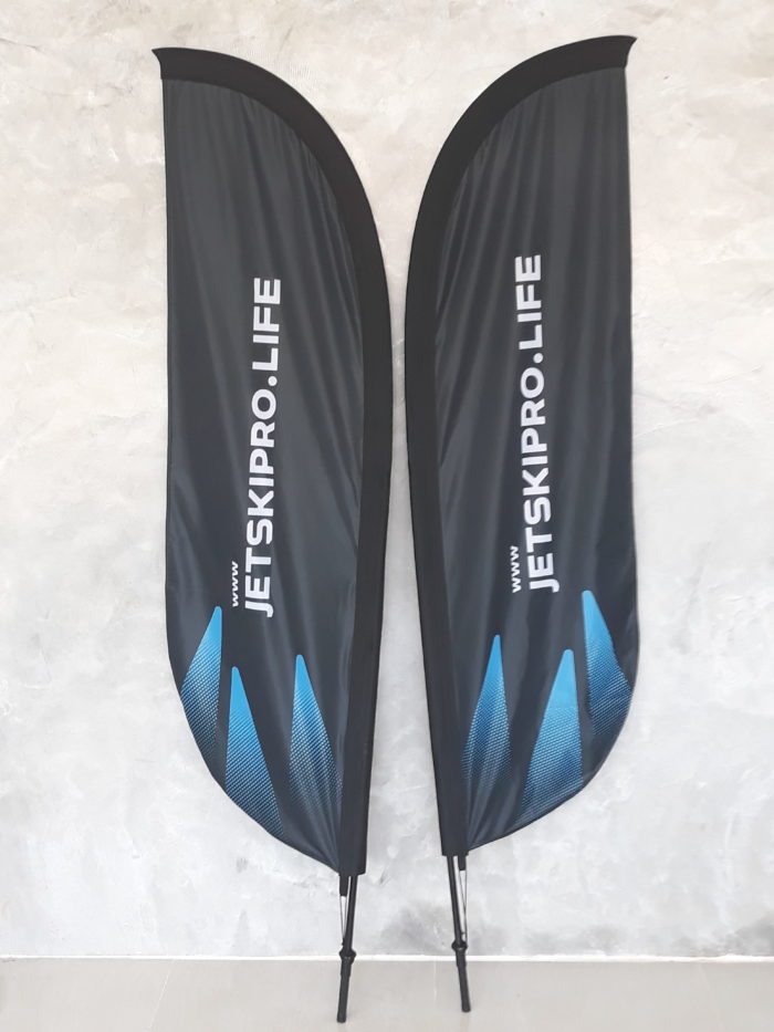 double sided printed beach flag. Black and blue jetskipro life design