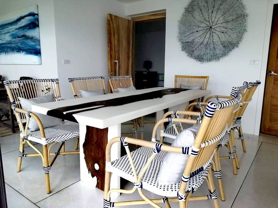 white epoxy table with natural cut wood design in living room