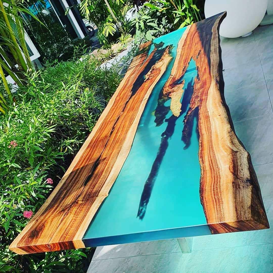 blue epoxy table with custom wood design
